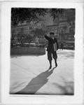 Newsboy Selling Papers Near War Memorial, New Jersey by George French